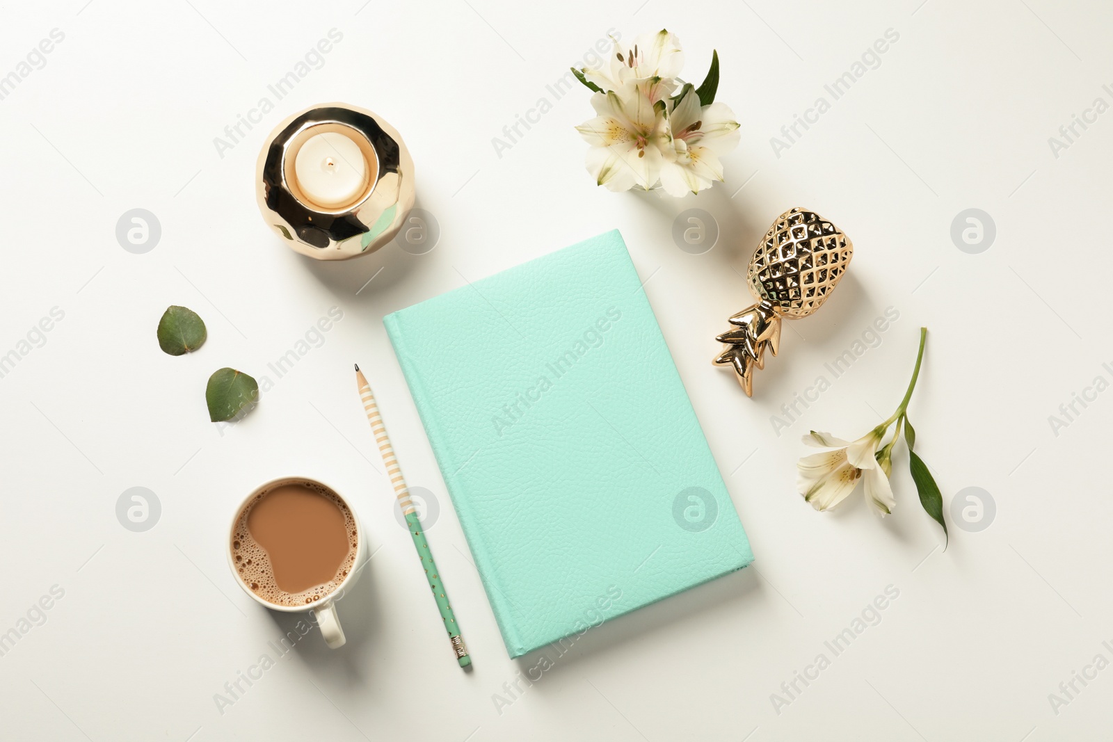 Photo of Flat lay composition with book, cup of coffee and decor elements on white background