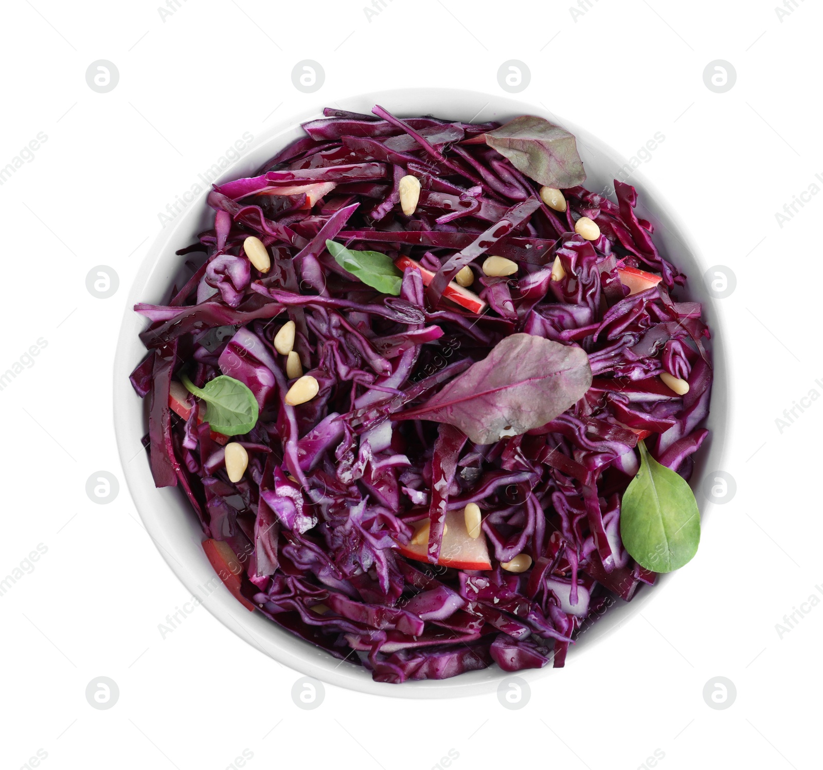 Photo of Fresh red cabbage salad in bowl isolated on white, top view