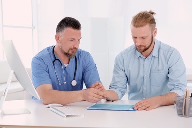 Man with health problems visiting urologist at hospital