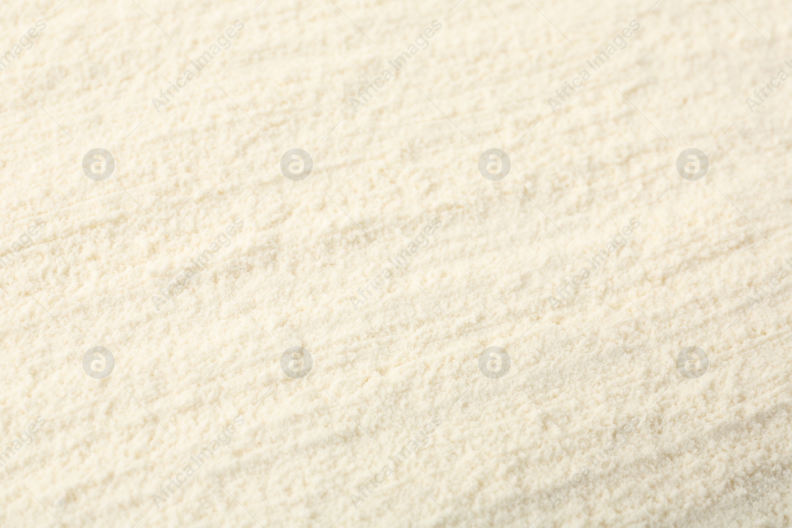 Photo of Texture of baking powder as background, closeup