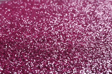 Photo of Closeup view of sparkling pink glitter background
