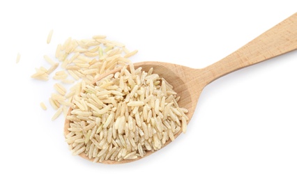 Photo of Wooden spoon with raw unpolished rice on white background, top view