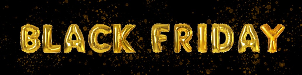 Phrase BLACK FRIDAY made of foil balloon letters on dark background. Banner design