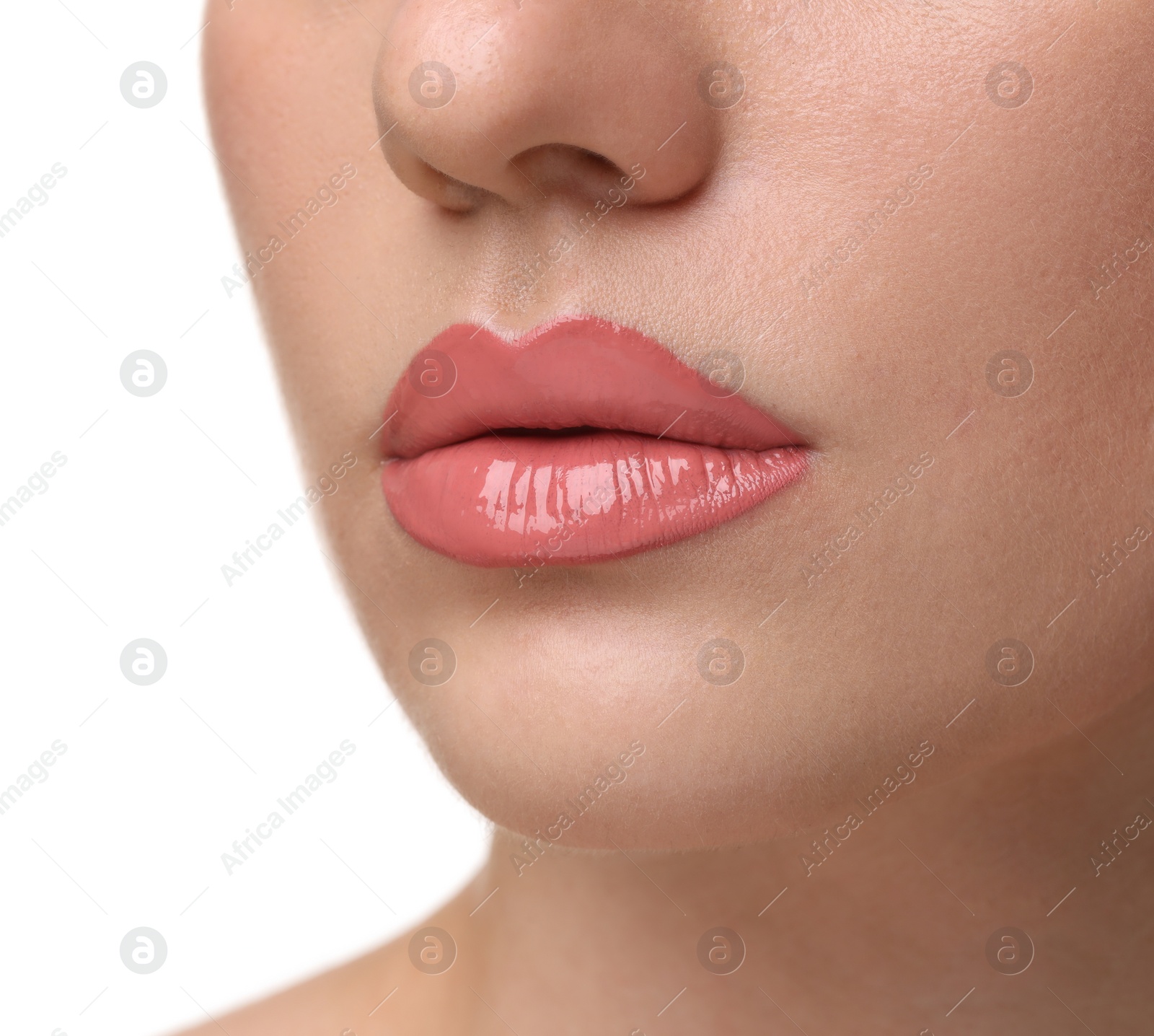 Photo of Woman wearing beautiful lip gloss on white background, closeup