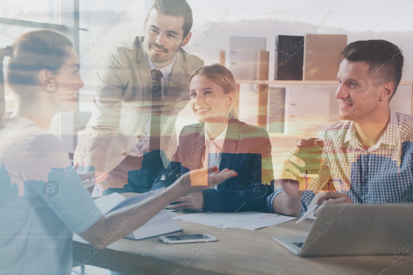 Image of Double exposure of team workers discussing questions in office and city with buildings                                                                     