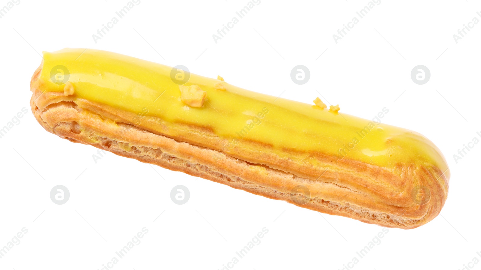 Photo of Delicious eclair covered with yellow glaze isolated on white