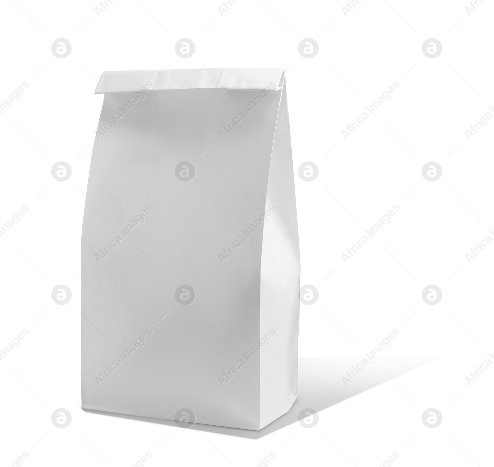 Image of New closed paper bag on white background