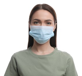 Young woman in medical mask on white background