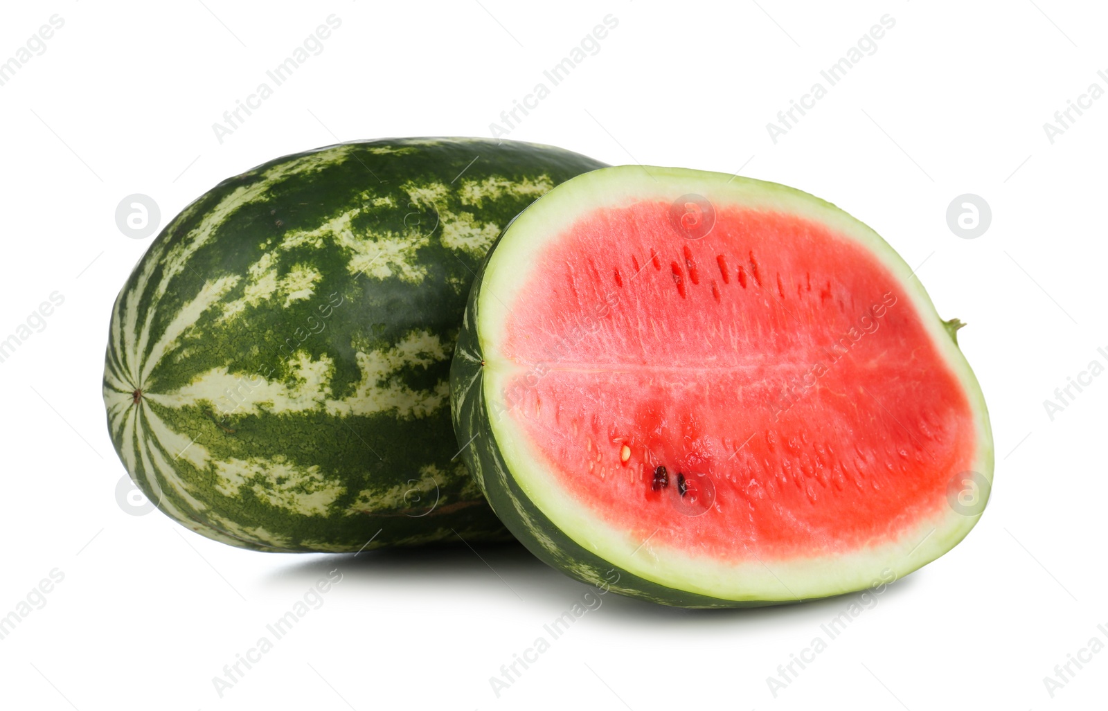 Photo of Delicious whole and cut watermelons isolated on white