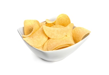 Bowl of tasty crispy potato chips on white background