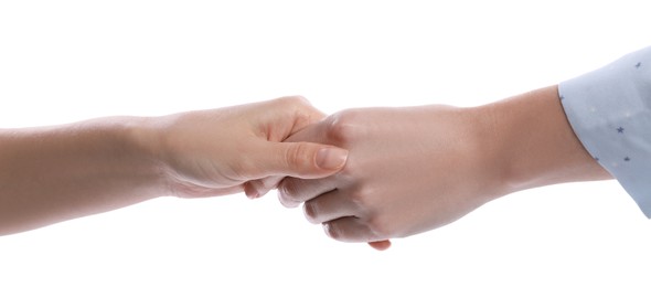 Photo of Women holding hands on white background, closeup