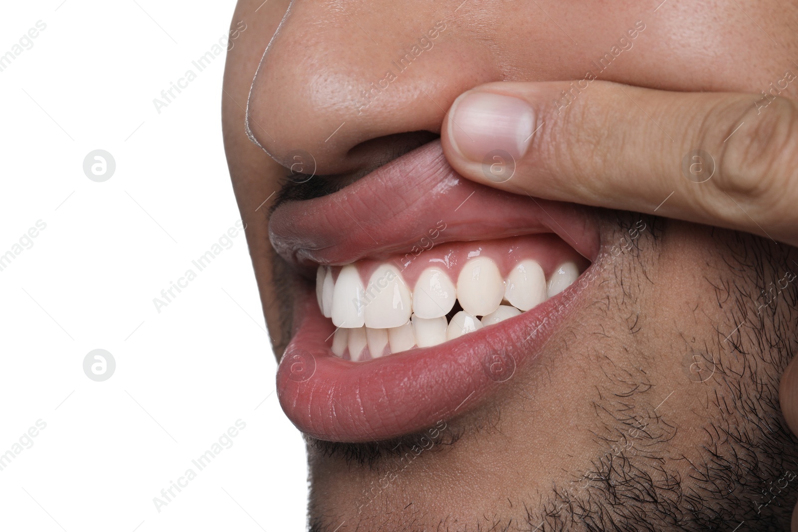 Photo of Man showing healthy gums on white background, closeup. Space for text