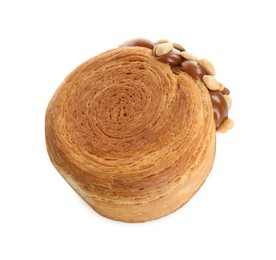 Photo of Round croissant with chocolate paste and nuts isolated on white, top view. Tasty puff pastry