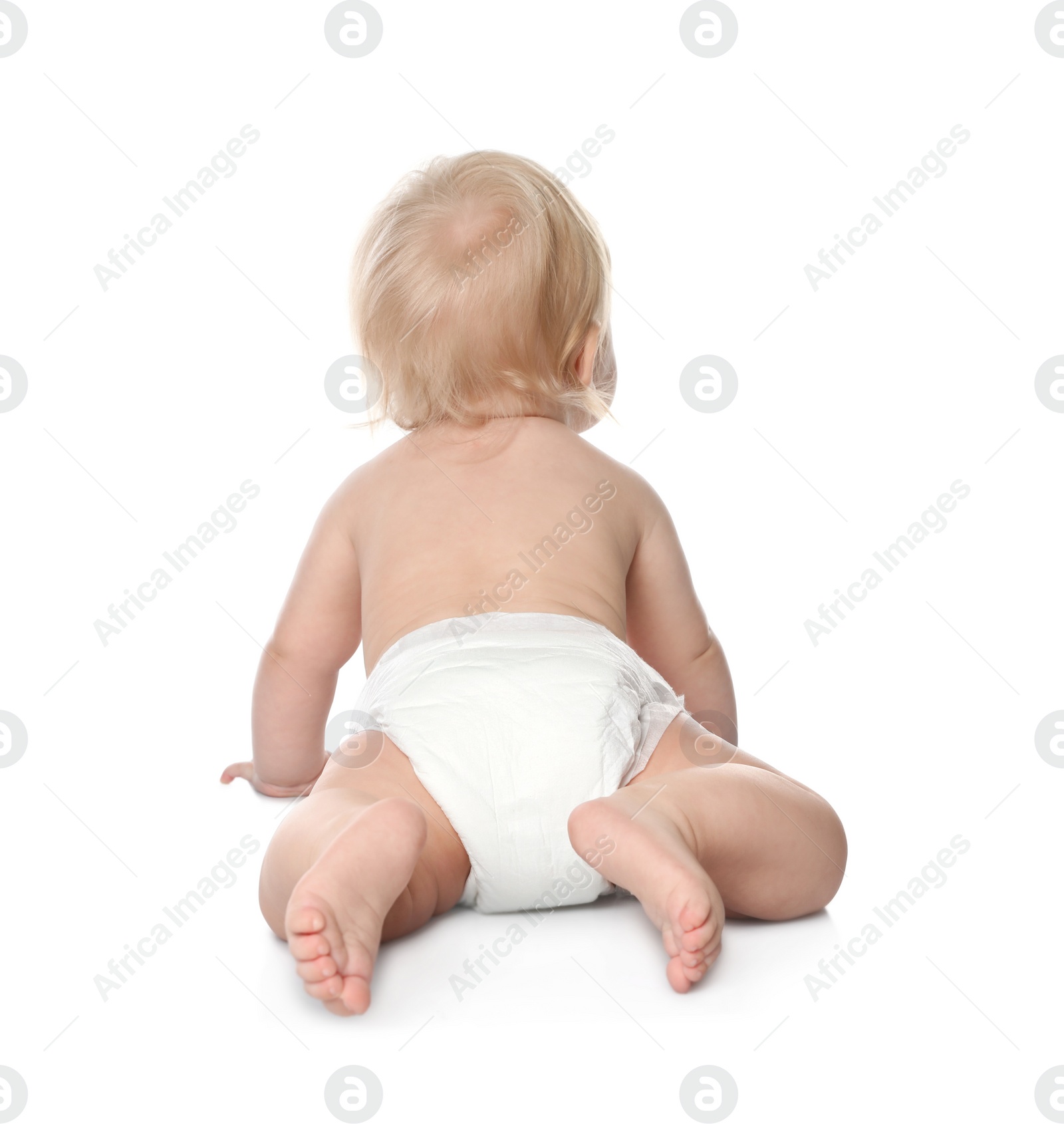 Photo of Little baby in diaper on white background, back view