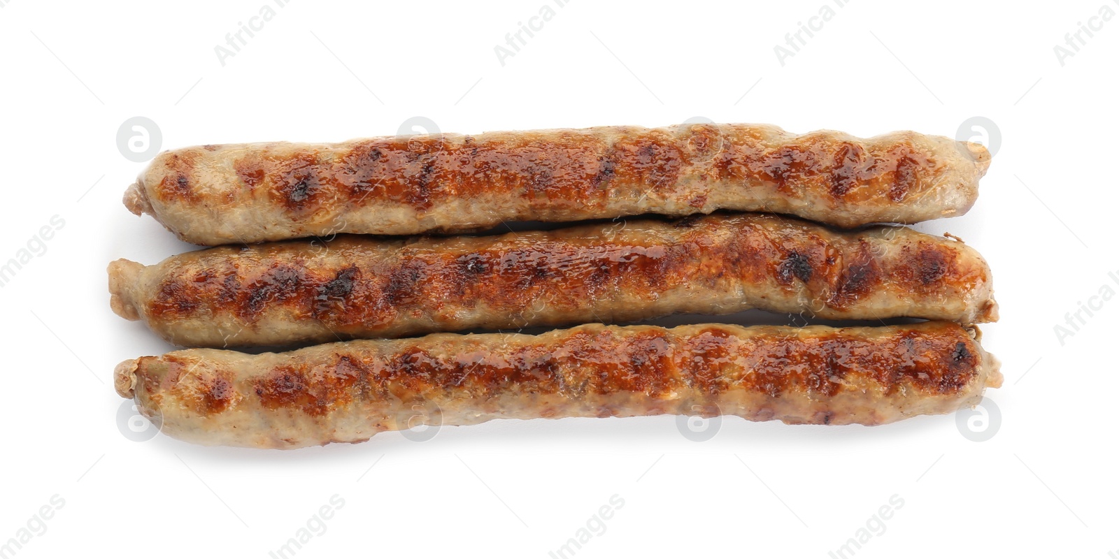 Photo of Tasty fresh grilled sausages isolated on white, top view