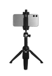Photo of Smartphone fixed to tripod on white background