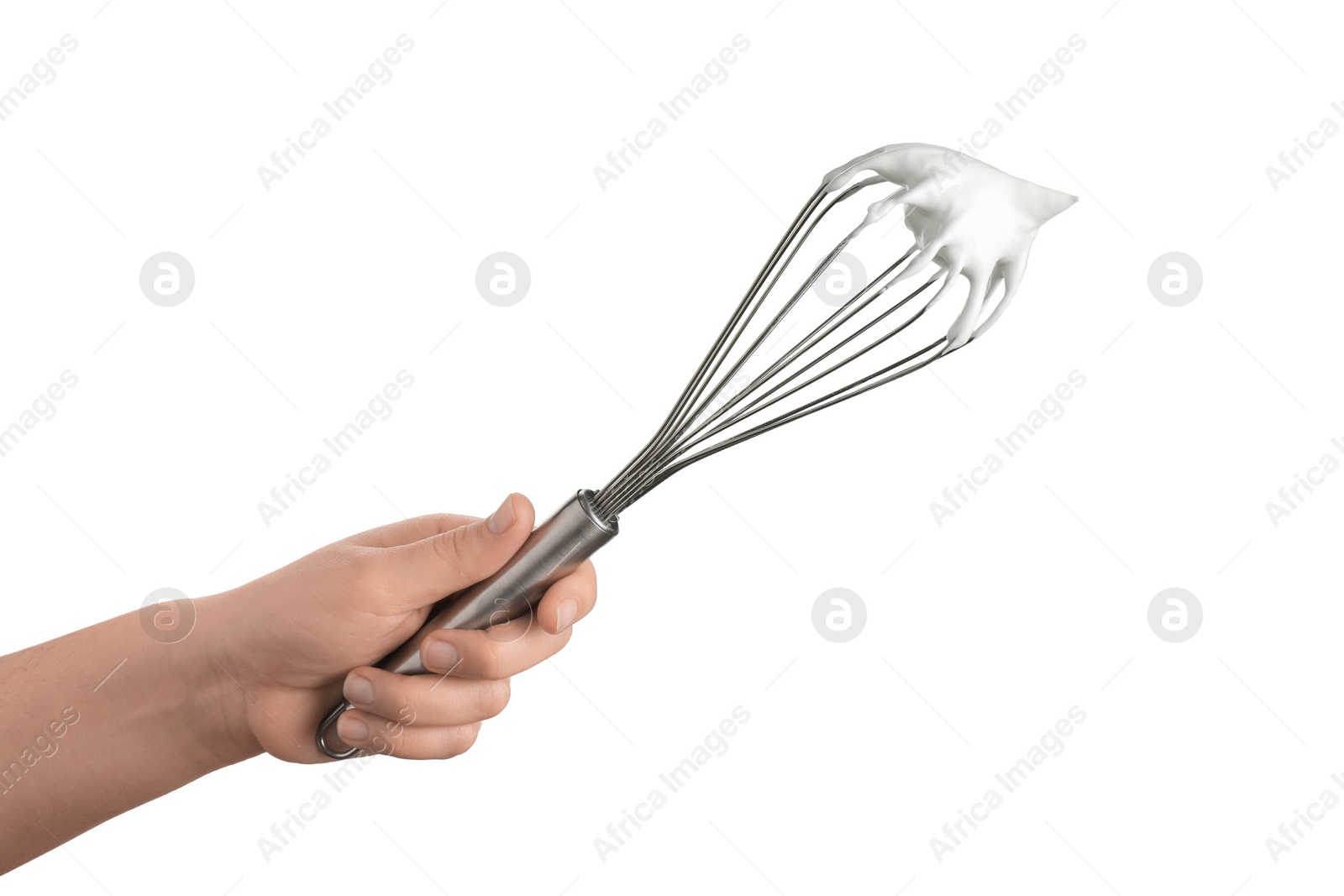 Photo of Woman holding whisk with whipped cream on white background, closeup