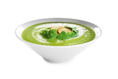 Photo of Bowl of broccoli cream soup with croutons on white background