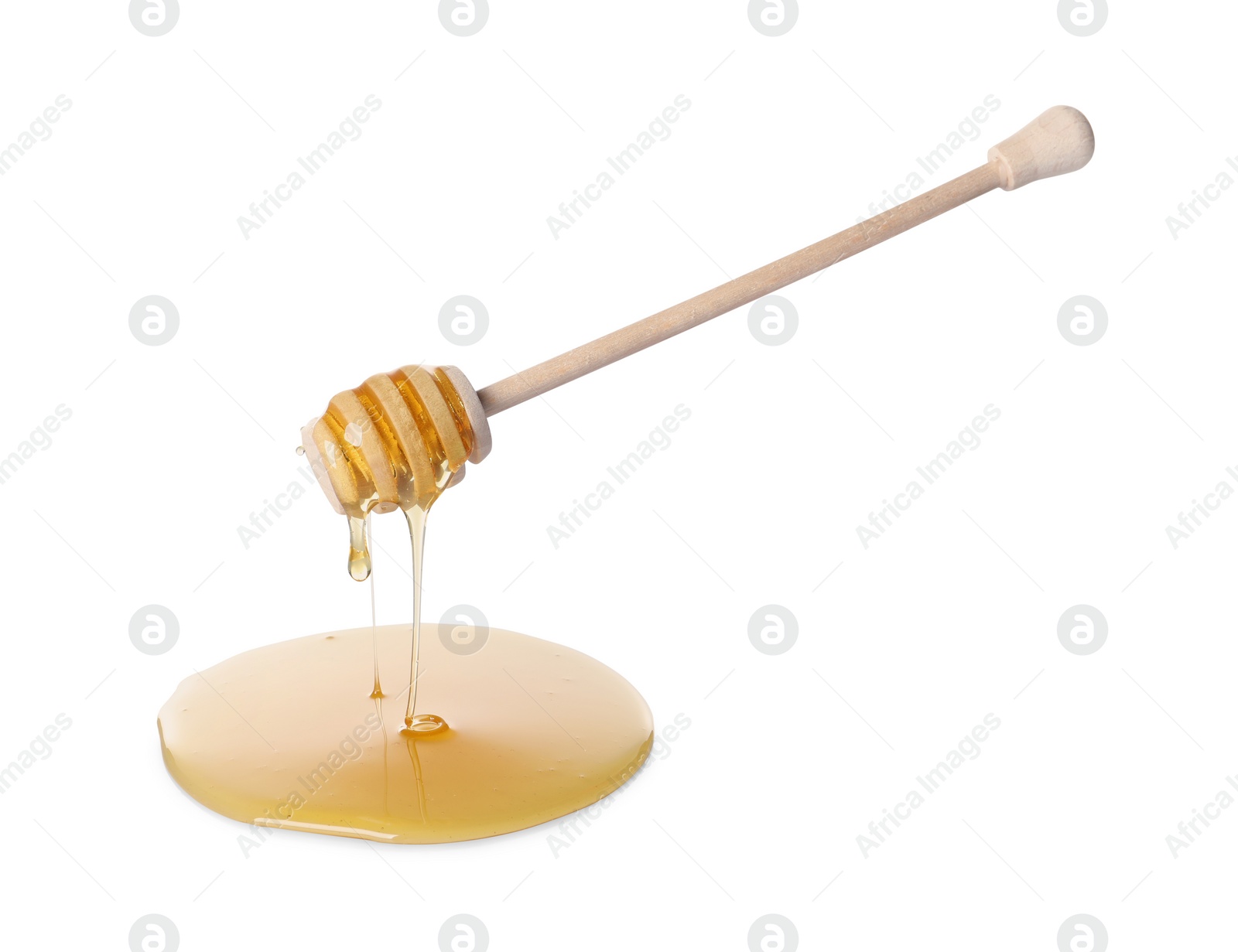 Photo of Fresh honey dripping from dipper on white background