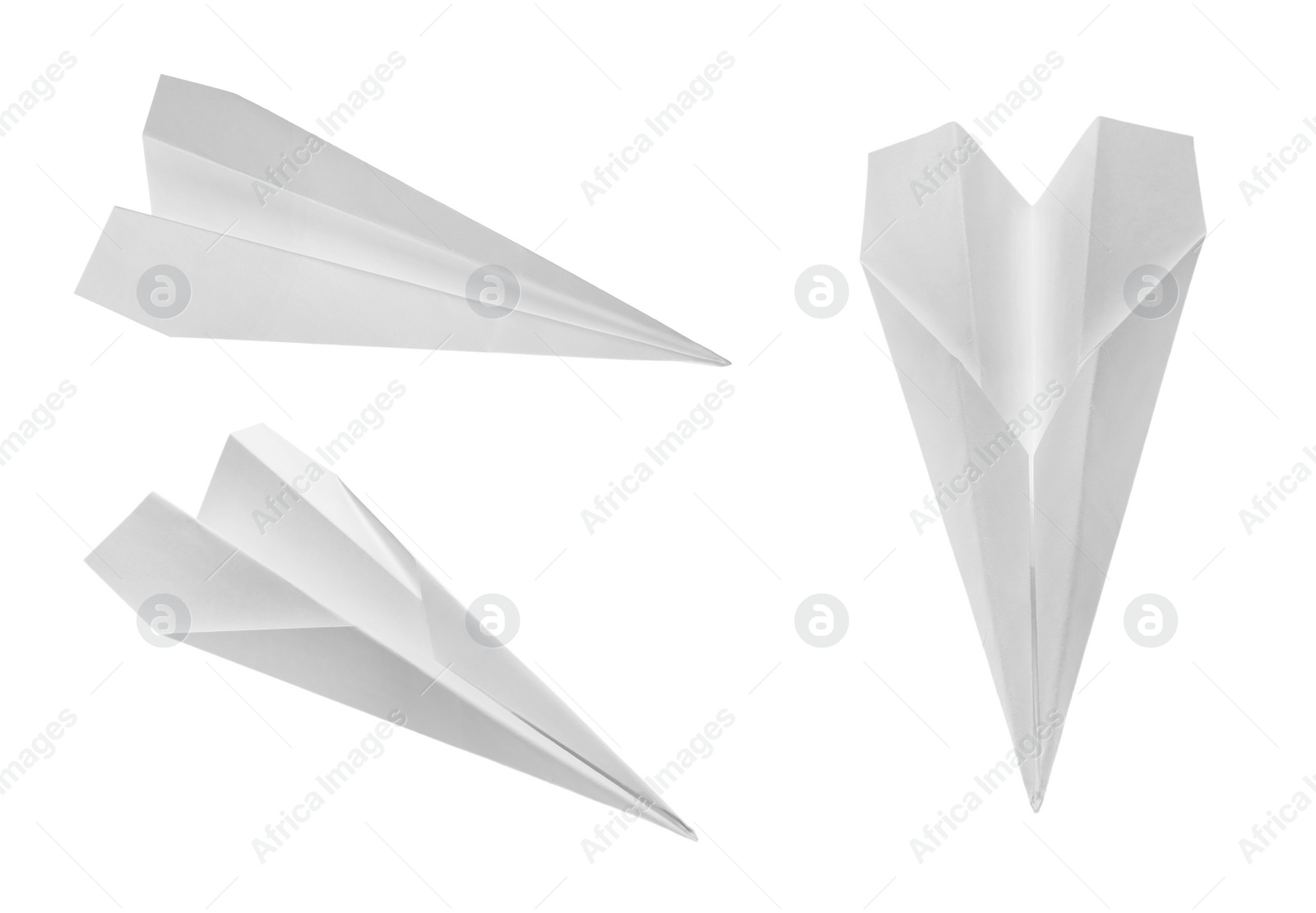 Image of Set with handmade paper planes on white background