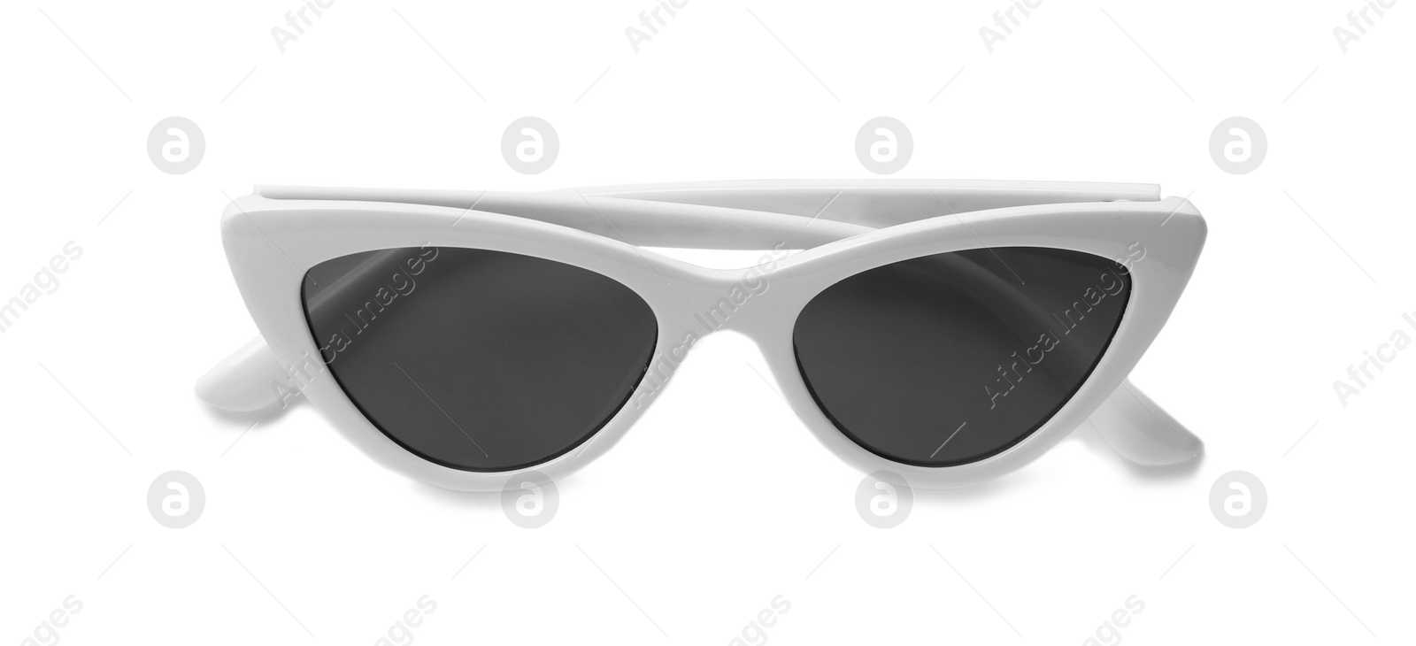 Photo of Stylish sunglasses on white background. Beach accessories