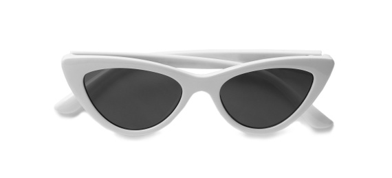 Photo of Stylish sunglasses on white background. Beach accessories