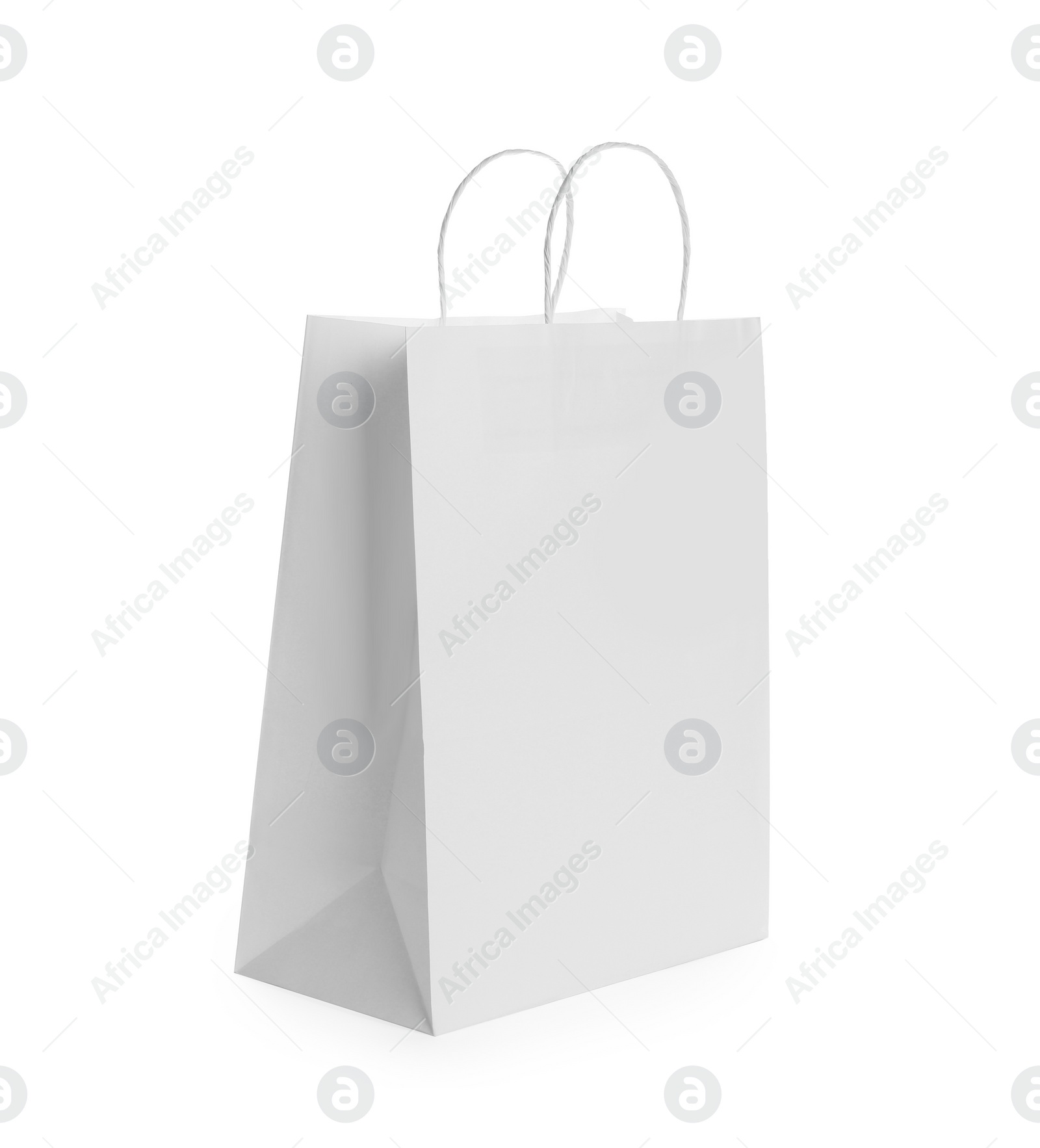 Photo of Blank paper bag isolated on white. Mockup for design