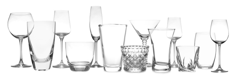 Image of Set of empty glasses on white background. Banner design