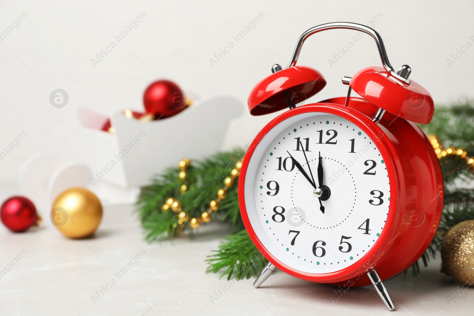 Photo of Retro alarm clock and decor on table. Christmas countdown