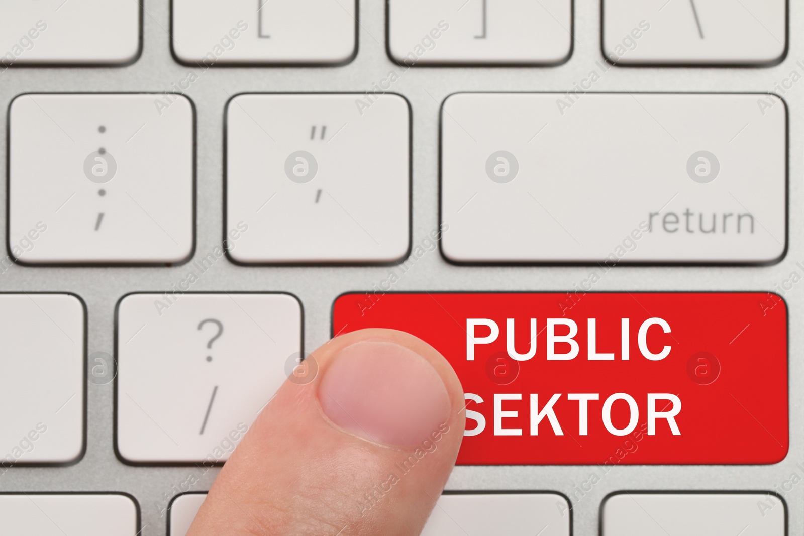 Image of Man pressing red button with text Public Sector on computer keyboard, closeup