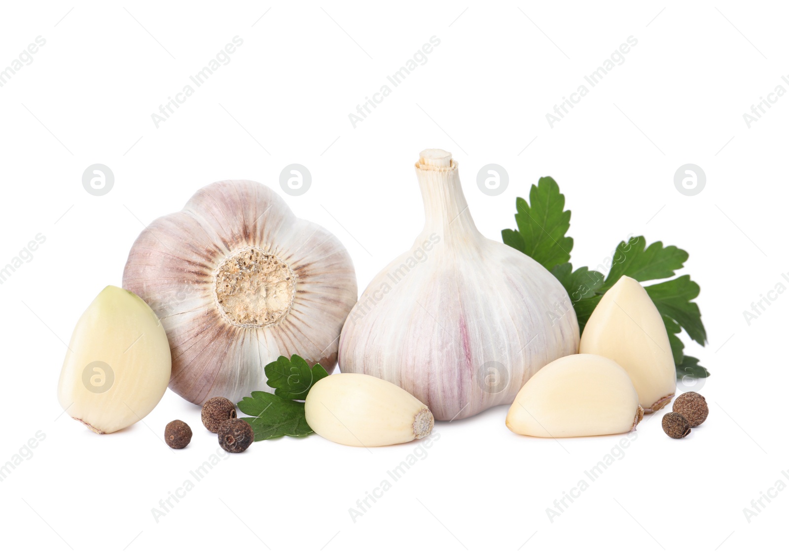 Photo of Fresh garlic bulbs and cloves with seasonings isolated on white. Organic food