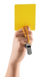 Photo of Referee holding yellow card and whistle on white background, closeup