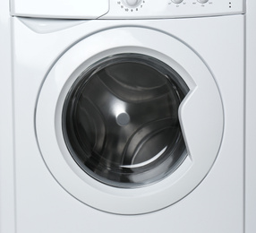 Photo of Modern empty washing machine on white background. Laundry day