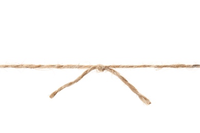 Photo of Hemp rope with knot on white background. Organic material