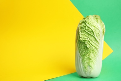 Photo of Fresh ripe cabbage on color background