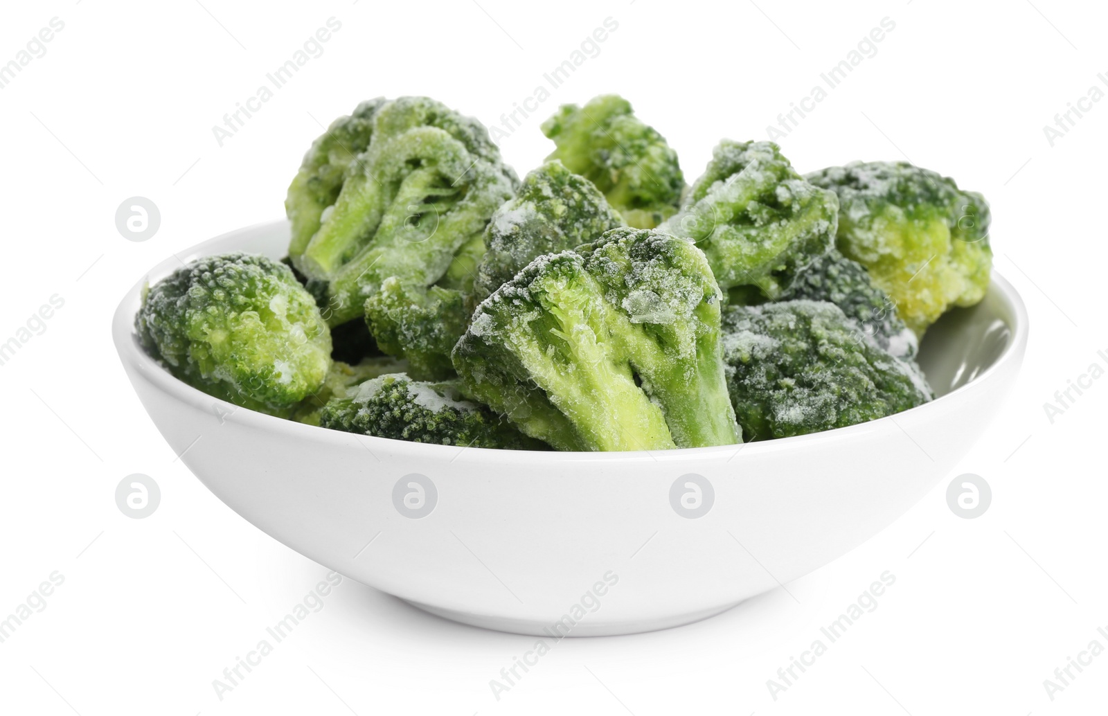 Photo of Frozen broccoli in bowl isolated on white. Vegetable preservation