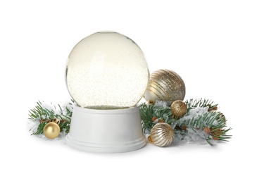 Photo of Beautiful empty snow globe, Christmas balls and fir branches on white background