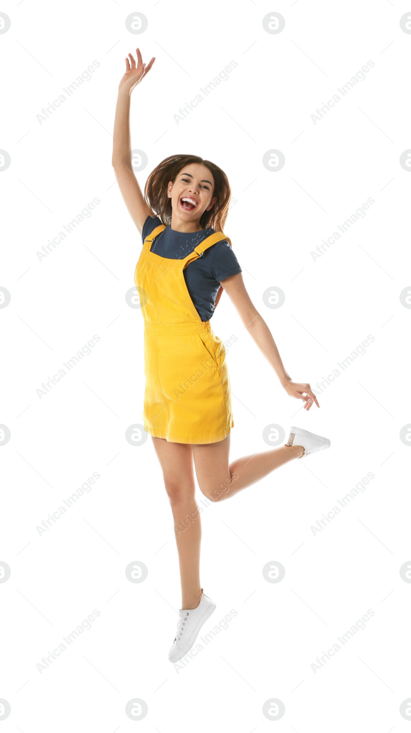 Photo of Full length portrait of pretty woman jumping on white background