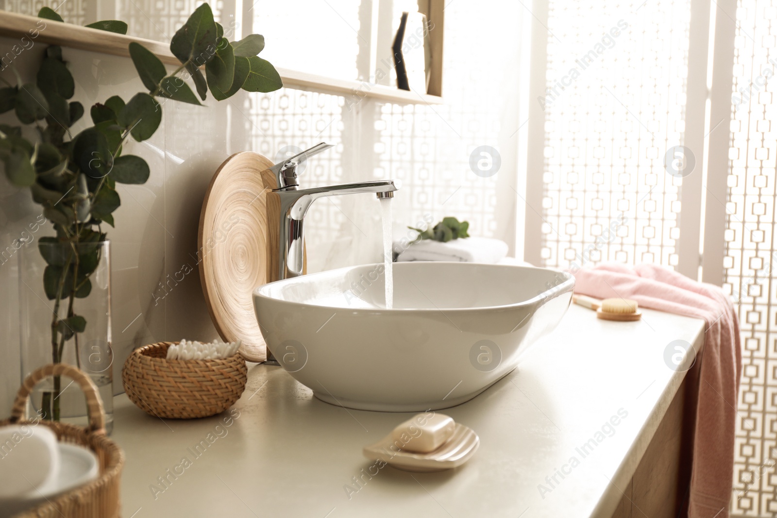 Photo of Stylish white sink in modern bathroom interior