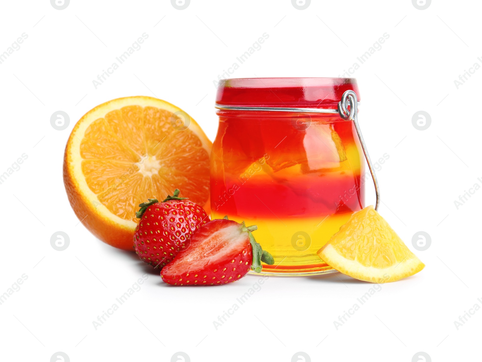 Photo of Tasty layered jelly dessert in glass and ingredients on white background