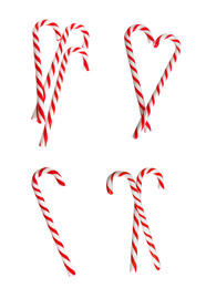 Set of tasty Christmas candy canes on white background