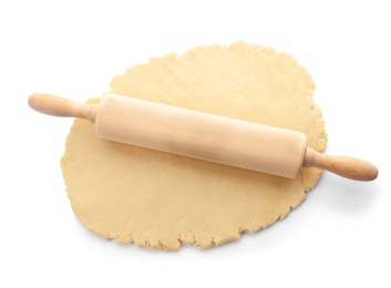 Photo of Raw dough and rolling pin on white background