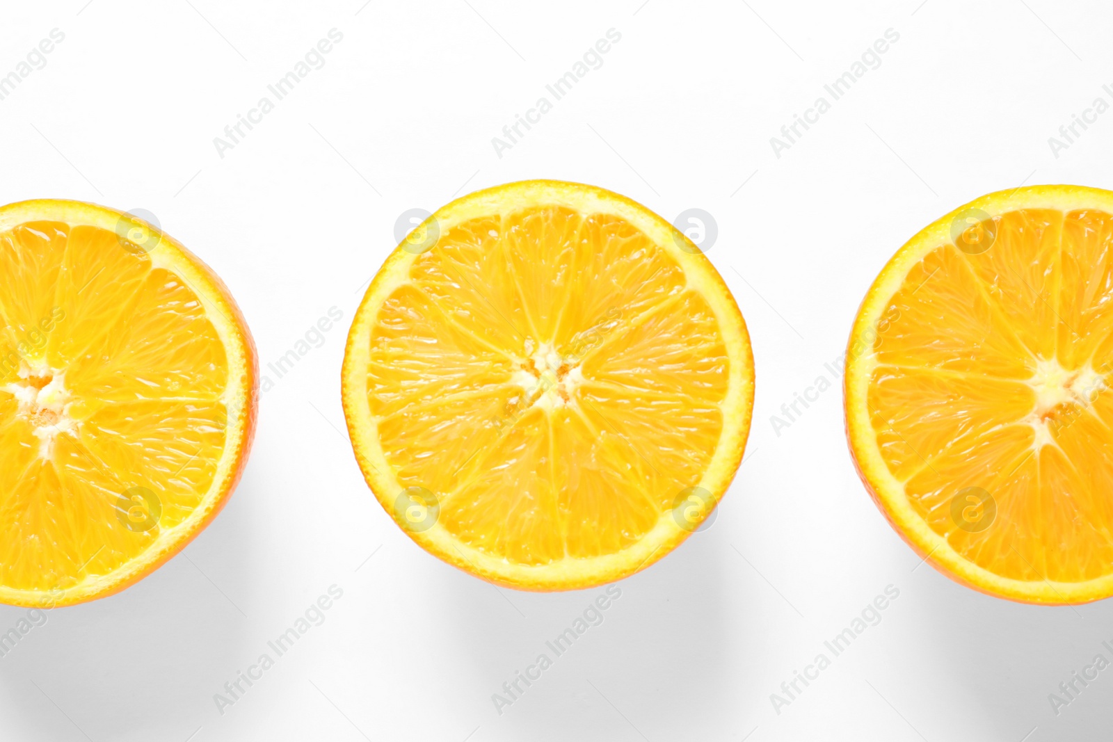 Photo of Juicy oranges on white background, top view