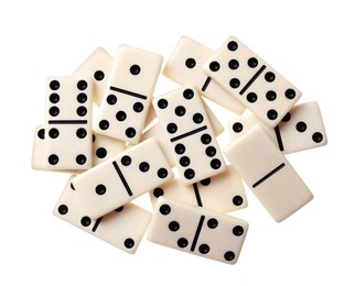 Photo of Pile of classic domino tiles on white background, top view