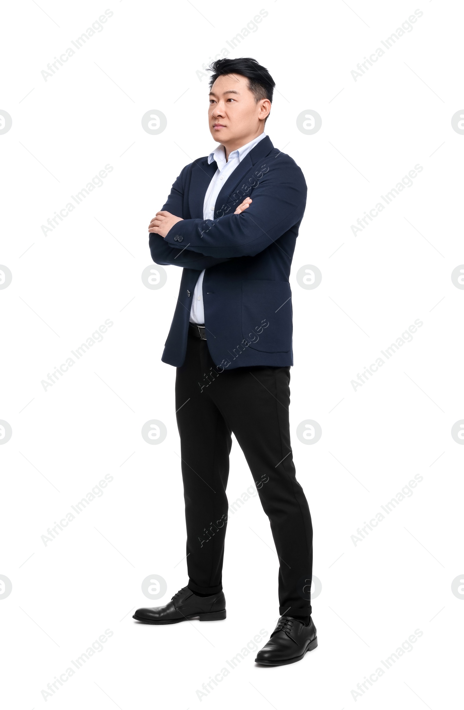 Photo of Businessman in suit posing on white background