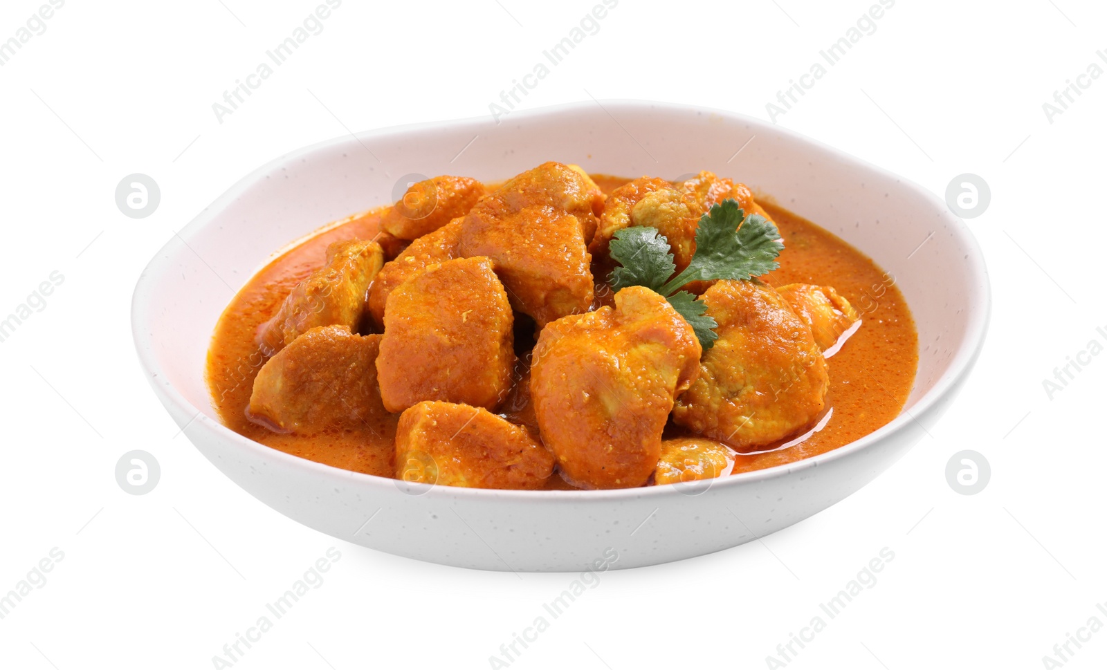 Photo of Bowl of delicious chicken curry on white background