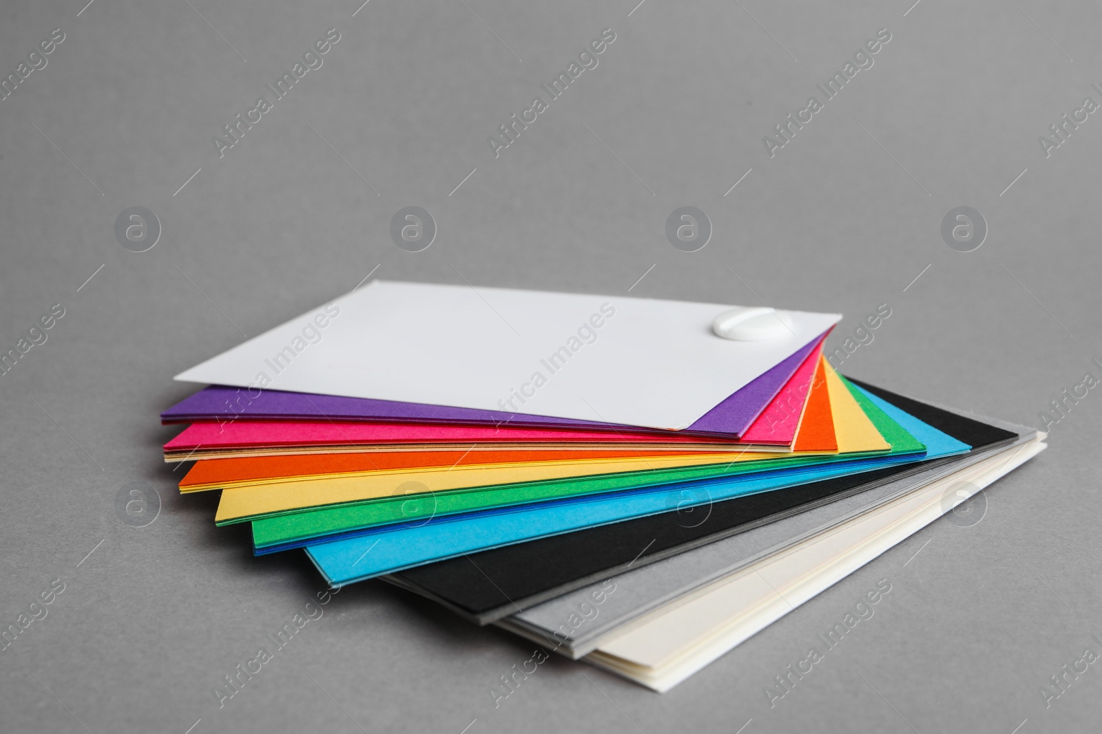 Photo of Color palette on grey background, closeup. Professional samples