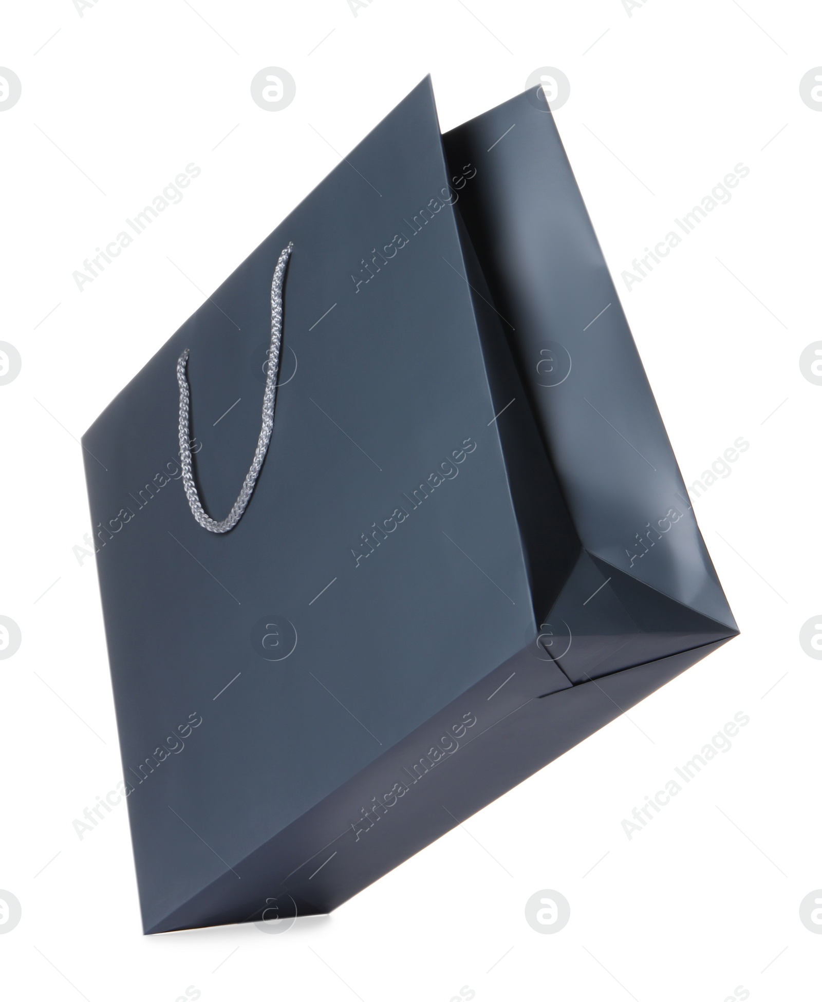 Photo of One grey shopping bag isolated on white