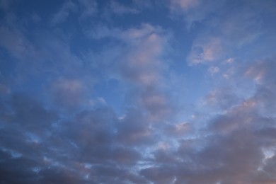 Beautiful blue sky with many dark clouds. Stormy weather