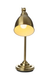 Photo of Stylish golden table lamp isolated on white